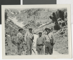 Photograph of four men outdoors, 1920s