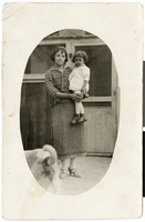 Postcard of Lenore Aquirre holding Alicia Rivero, 1920-1929