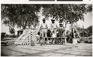 Photograph of Fransisco Rivero and helpers at the Hazzle Street adobe company, North Las Vegas (Nev.), 1948