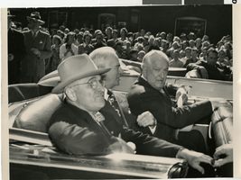 Photograph of Harry S. Truman, Vail Pittman, and James Farley riding in an open automobile, 1940s