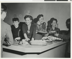 Photograph of Florence Lee Jones Cahlan and others at USO effort, 1950s