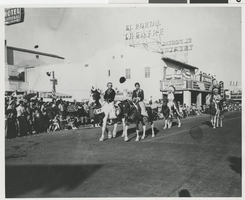 Photograph of Clarence Cleveland and others in a parade, 1940s