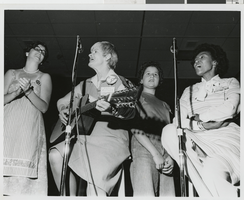 Photograph of performers at the Nevada Women's Conference, Las Vegas (Nev.), June 17, 1977
