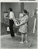 Photograph of art works and volunteers, Las Vegas (Nev.), June 17, 1977