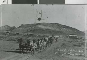 Photograph of a carriage leaving the tent camp in Bullfrog (Nev.), 1905