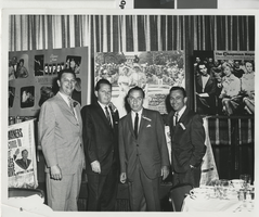Photograph of Lloyd Katz with three unidentified men, early 1960s
