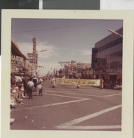 Photograph of people holding a sign in the Helldorado Parade, Las Vegas (Nev.), May 1963