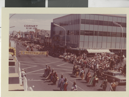 Photograph of people holding a sign at the Helldorado Parade, Las Vegas (Nev.), May 1963
