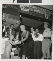 Photograph of Peggy Lee in front of the Fremont Theatre, Las Vegas (Nev.), 1955