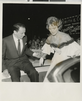 Photograph of Frank Sinatra with an unidentified woman at the Fremont Theatre in Las Vegas (Nev.) 1960