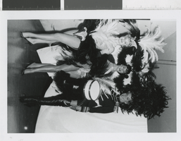Photograph of costumed showgirls posing backstage, Las Vegas (Nev.), 1957-1960s