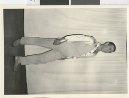 Photograph of a male dancer wearing a jumpsuit, Dunes Hotel, Las Vegas (Nev.), 1957-1960s