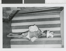 Photograph of showgirl in topless costume, Las Vegas (Nev.), 1957-1960s