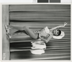 Photograph of a showgirl in a white fur costume, Las Vegas (Nev.), 1957-1960s