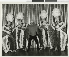 Photograph of Irving Benson with four Minsky's showgirls at the Aladdin Hotel and Casino, Las Vegas (Nev.), 1972