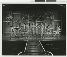 Photograph of seventeen cast members on stage at the Aladdin Hotel, Las Vegas (Nev.), 1970