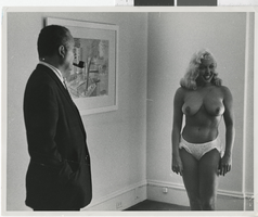 Photograph of Harold Minsky and a showgirl, 1970-1979