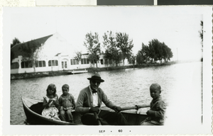 Photograph of Wengert family in a boat, 1933-1936.