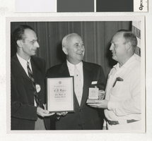 Photograph of C. D. Baker receiving a plaque, Las Vegas (Nev.), 1950s -1960s