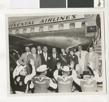Photograph of Nevada Jaycees greeting Continental Airlines passengers, 1940s-1950s
