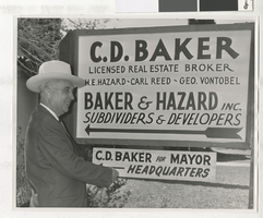 Photograph of C. D. Baker and his business sign, Las Vegas (Nev.), circa 1951