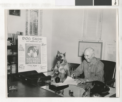 Photograph of C. D. Baker and Blim the dog, Las Vegas (Nev.), September 1953