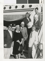 Photograph of C. D. Baker and others at McCarran Field, Las Vegas (Nev.), 1950s