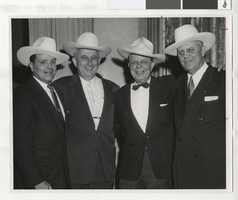 Photograph of Hoot Gibson and C. D. Baker greeting foreign dignitaries, Las Vegas (Nev.), 1950s -1960s