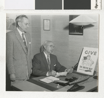 Photograph of C. D. Baker at his desk, Las Vegas (Nev.), 1950s