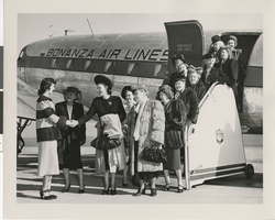 Photograph of people boarding a plane, 1945-1968