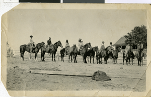 Photograph of horsemen at the Newman House, Pioche (Nev.), early 1900s