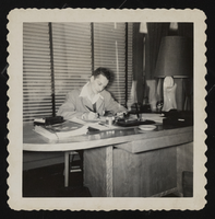 Photograph of Donn Arden in an office, 1930s-1950s