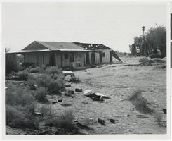 Photograph of hotel remains near railroad, (Calif.), 1906-1928