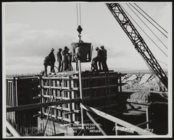 Photograph of workers pouring concrete for building construction, Henderson (Nev.), December 29, 1941