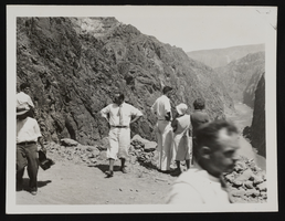 Photograph of spectators near the edge of a cliff, Hoover Dam, approximately 1931-1936