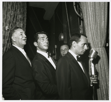 Photograph of Jack Entratter, Dean Martin, Frank Sinatra, and Joey Bishop backstage, Las Vegas, early 1960s