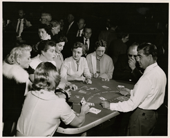 Photograph of gamblers at the blackjack table, Sands Hotel and Casino, Las Vegas, circa late 1950s-early 1960s