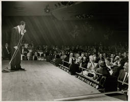 Photograph of Dean Martin with celebrities stage-side, Las Vegas, March 6, 1957