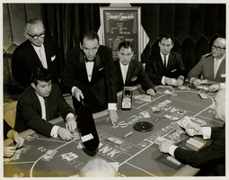 Photograph of Frank Sinatra dealing baccarat in the Sands Casino, Las Vegas, November 1959