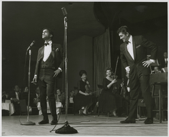 Photograph of Sammy Davis, Jr. and Dean Martin entertaining in the Copa Room, Las Vegas, 1963
