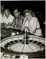 Photograph of gamblers at the roulette table, Sands Hotel and Casino, Las Vegas, circa late 1950s-early 1960s