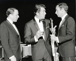 Photograph of Frank Sinatra, Dean Martin and Joey Bishop during one of their Summit Meetings in the Copa Room at the Sands Hotel, Las Vegas, April 1966