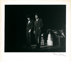 Photograph of Peter Lawford and Sammy Davis, Jr. performing onstage in the Copa Room, the Sands Hotel, Las Vegas, 1960