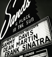 Photograph of the Sands Hotel marquee advertising Sammy Davis, Dean Martin and Frank Sinatra, Las Vegas, 1963