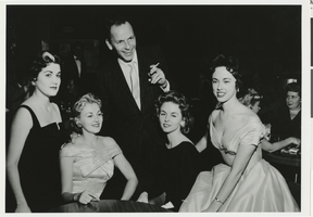 Photograph of Frank Sinatra at a party with several Copa Girls at the Sands Hotel, Las Vegas, circa 1960s