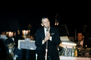 Slide transparency of Frank Sinatra singing at the Copa Room in the Sands Hotel, Las Vegas, February 1963
