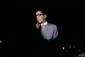 Slide transparency of Sammy Davis, Jr. performing in the Copa Room of the Sands Hotel, Las Vegas, February 1963