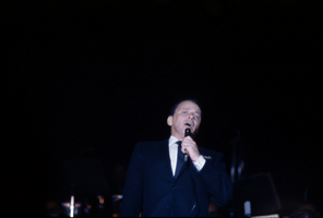Slide transparency of Frank Sinatra performing onstage at the Sands Hotel, February 1963