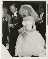 Photograph of Frank Sinatra walking his daughter, Nancy, down the aisle, Las Vegas, September 11, 1960