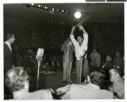 Photograph of Jerry Lewis and Dean Martin recording a radio program for ABC, Las Vegas, circa 1950s